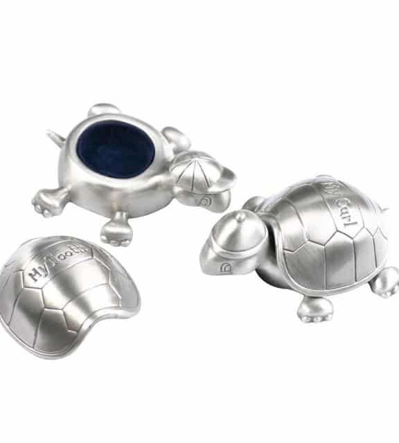 NORDAHL FØRSTE TAND OG HÅTLOK FORTINNET - 96015473126